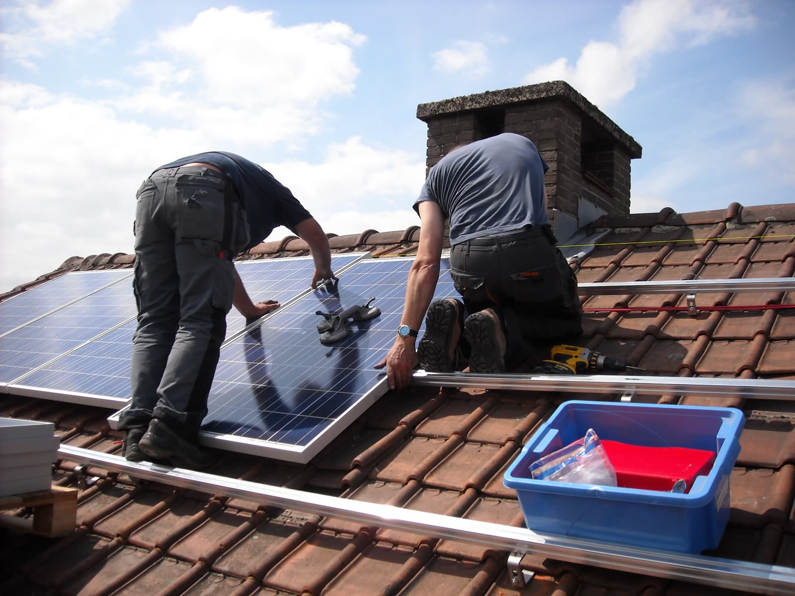 Tradespeople on a roof